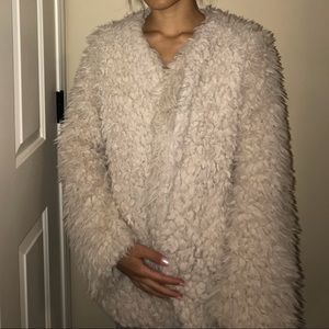 fluffy light tan coat